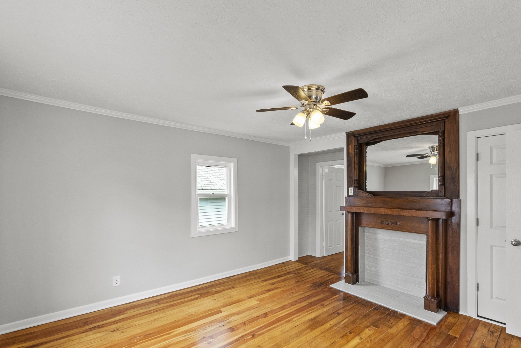104 North Walnut Street Springfield, TN 37172 - Photo 8 of 19 a view of an empty room with wooden floor and a window
