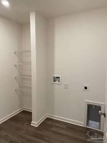 a view of a room with racks on the wall