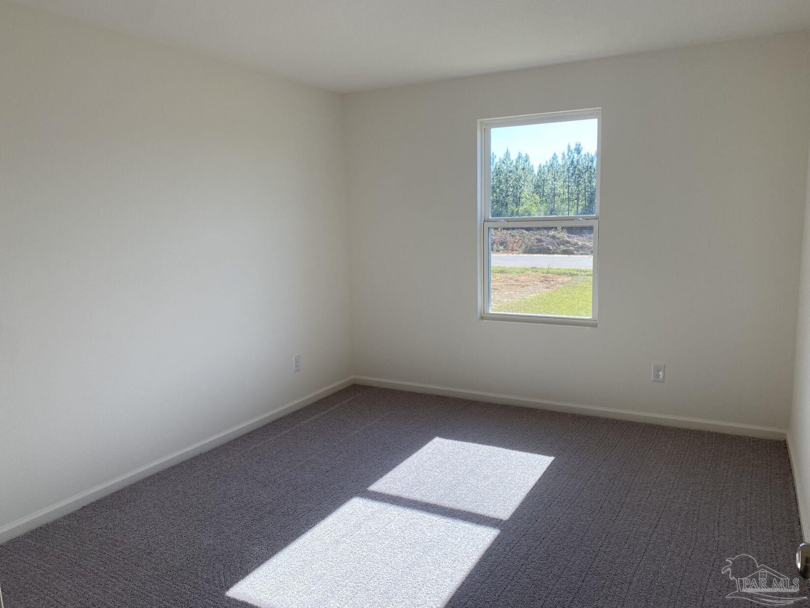 9252 3 Hollow Road Jay, FL 32565 - Photo 10 of 18 an empty room with windows