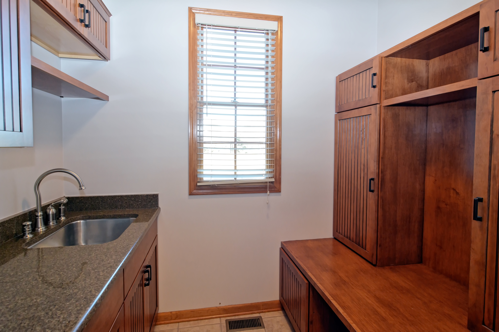 39W203 Cranston Road St. Charles, IL 60175 - Photo 14 of 36 a kitchen with a sink a window and wooden floor