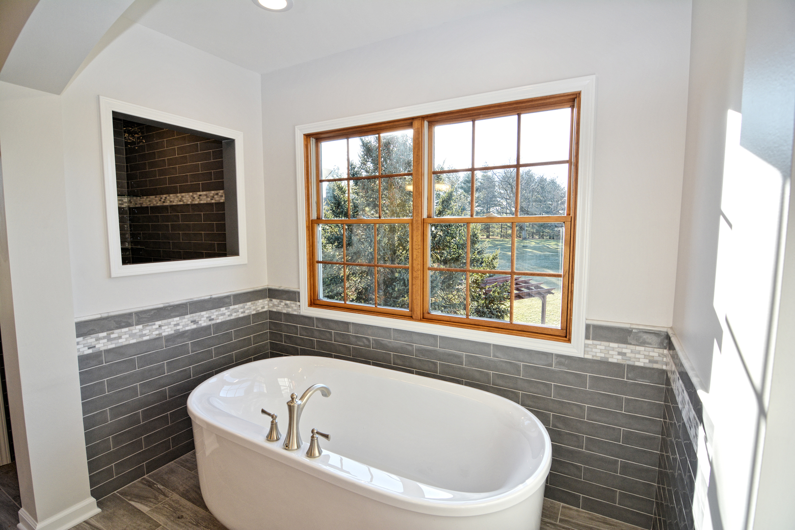39W203 Cranston Road St. Charles, IL 60175 - Photo 22 of 36 a bathroom with a bathtub and window
