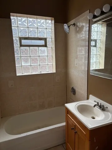 a bathroom with a sink and a bathtub