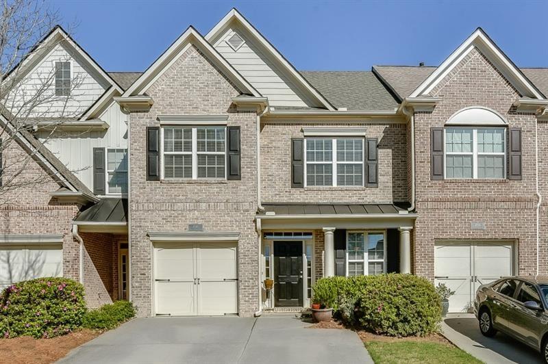 4245 Cold Spring Court Cumming, GA 30041 - Photo 1 of 1 a view of a house with a yard and potted plants