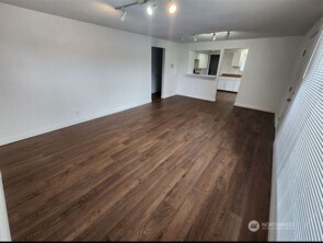 12524 Addison Street Southwest Lakewood, WA 98499 - Photo 17 of 17 a view of empty room with wooden floor and fan