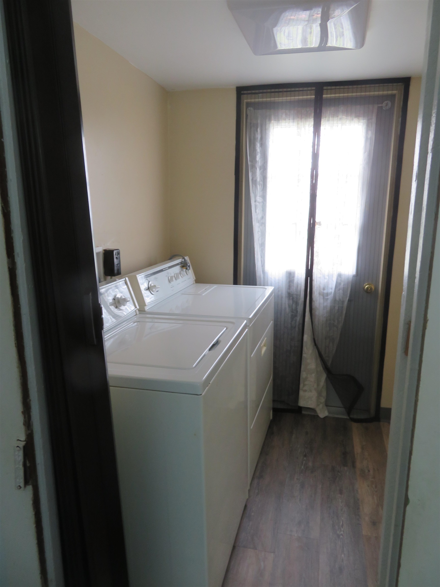 6940 West Stephenson St Road Freeport, IL 61032 - Photo 16 of 25 a utility room with dryer and washer