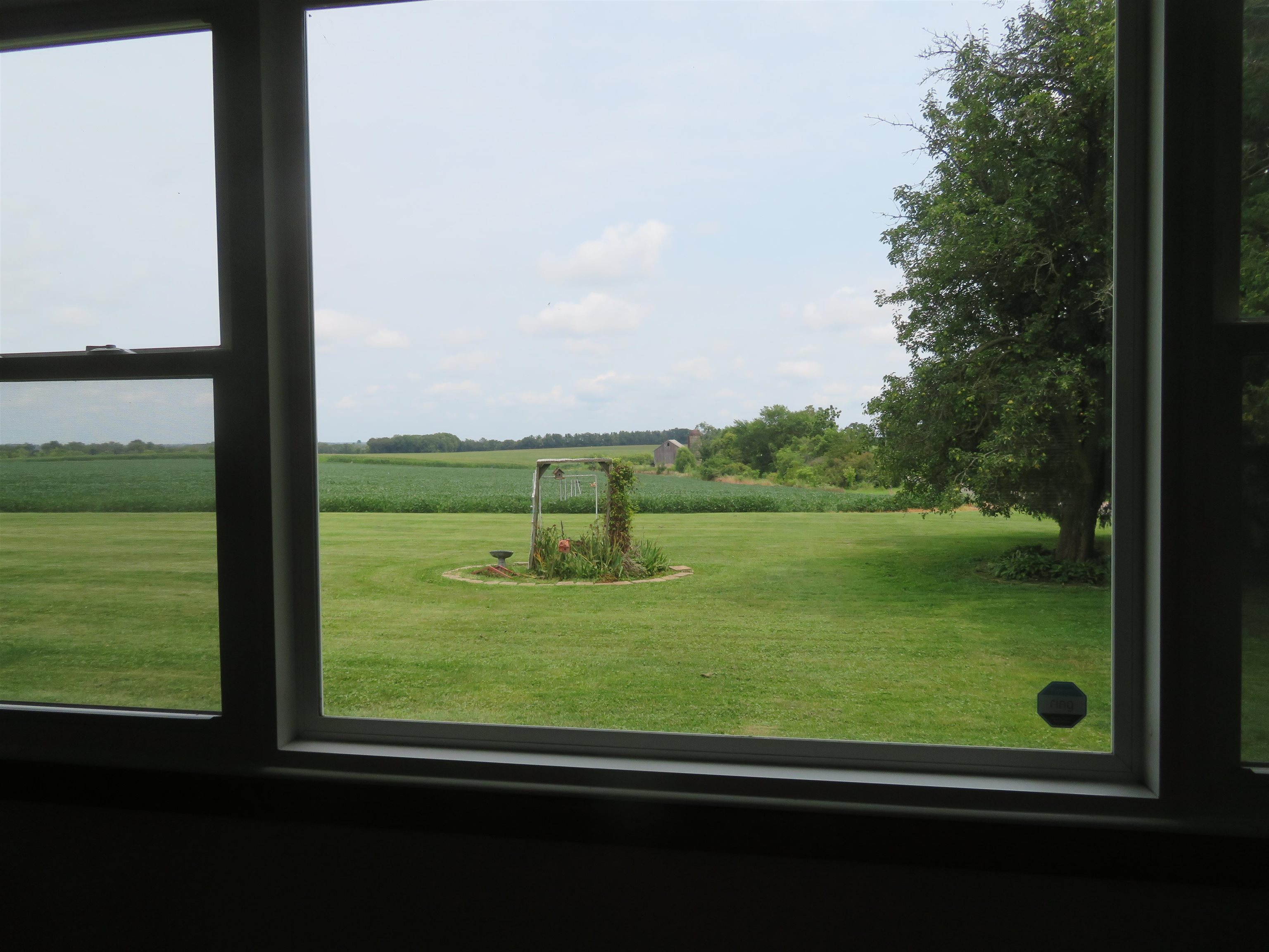 6940 West Stephenson St Road Freeport, IL 61032 - Photo 6 of 25 a view of lake from a window