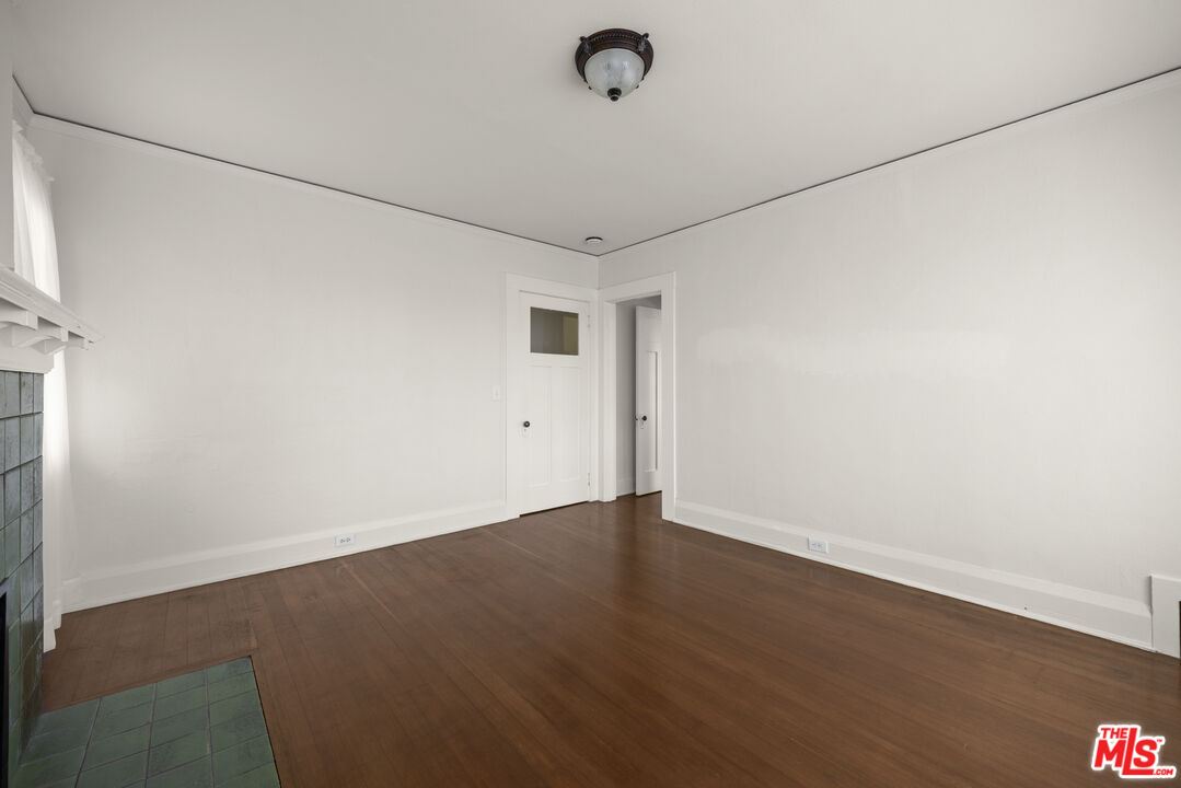 2027 3rd Street Santa Monica, CA 90405 - Photo 16 of 17 an empty room with wooden floor and windows