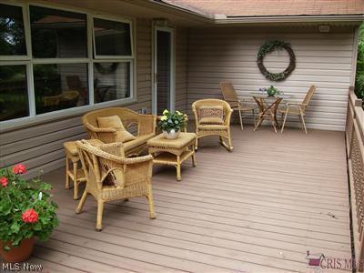 Come on by and enjoy the views from this welcoming porch/deck. How many homes can offer such a cozy, inviting space?  Just a sign of things to come in this charming home.