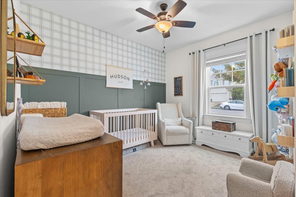 19305 Nathan Scott Way Manor, TX 78653 - Photo 13 of 18 a bedroom with furniture and a window