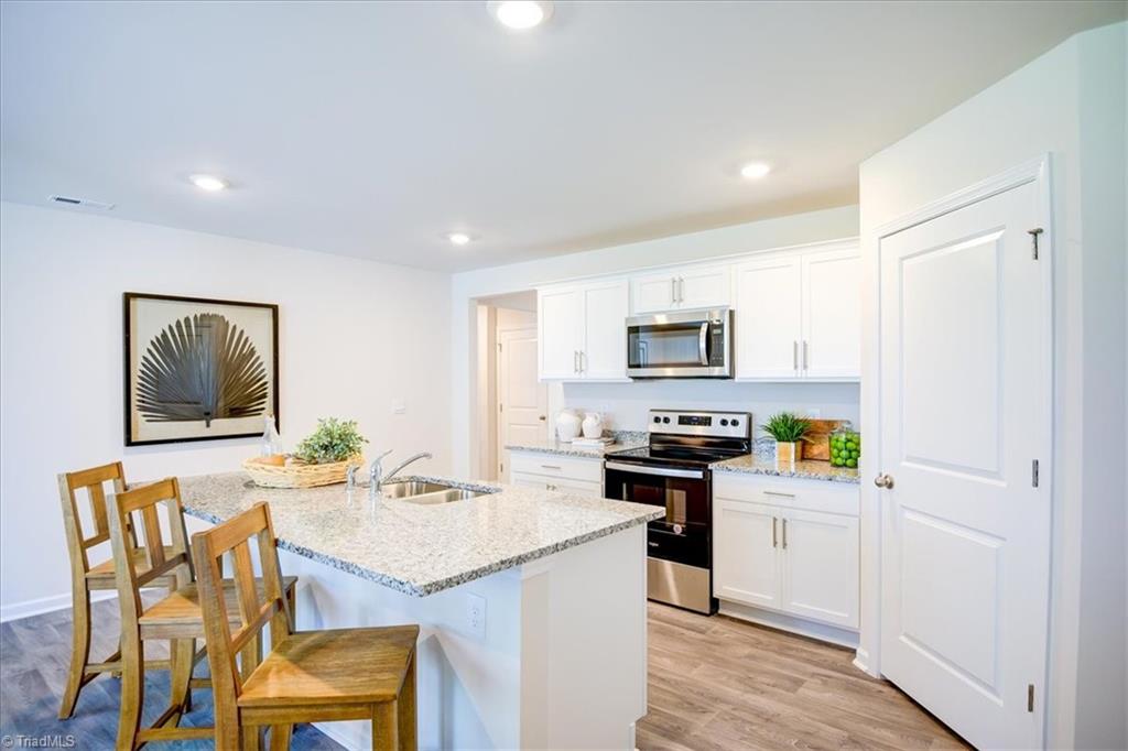 122 Forrest Oaks Drive King, NC 27021 - Photo 16 of 47 Photos are representations and not the actual home. These photos are for informational purposes only.