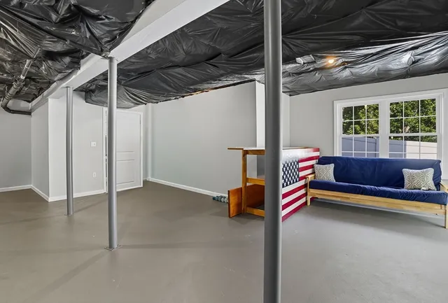 a room with stairs and a table