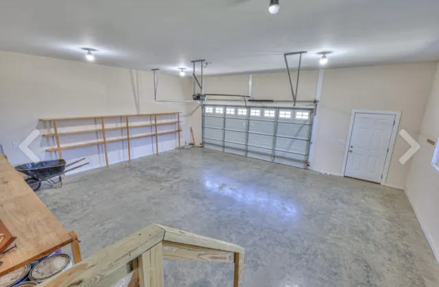 a view of a livingroom with a furniture