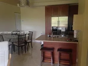 $208,000 | 901 Lyons Road, Unit 1208, Coconut Creek, FL 33063