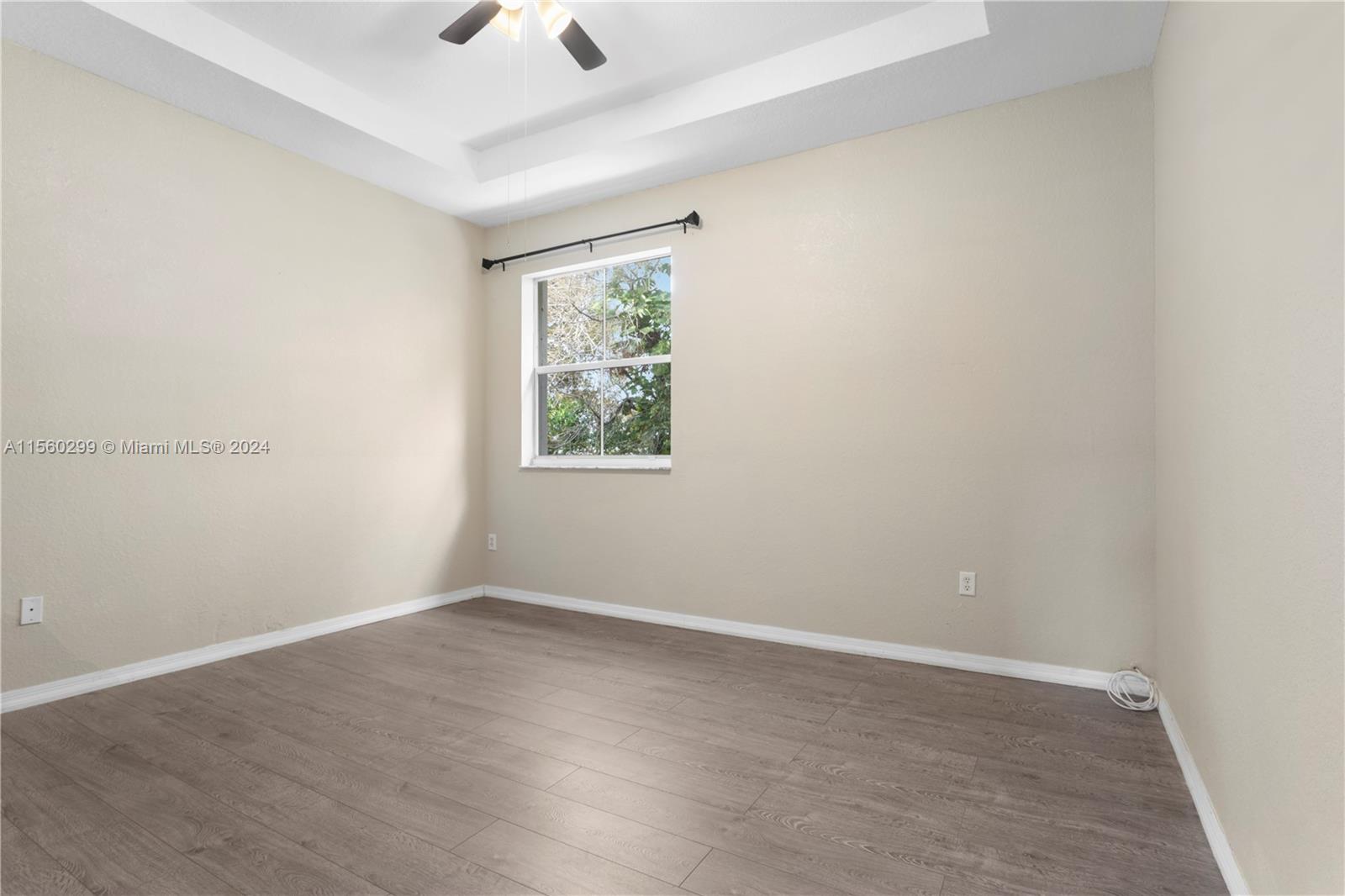 14033 Southwest 49th Street, Unit 6 Miramar, FL 33027 - Photo 16 of 25 an empty room with a window