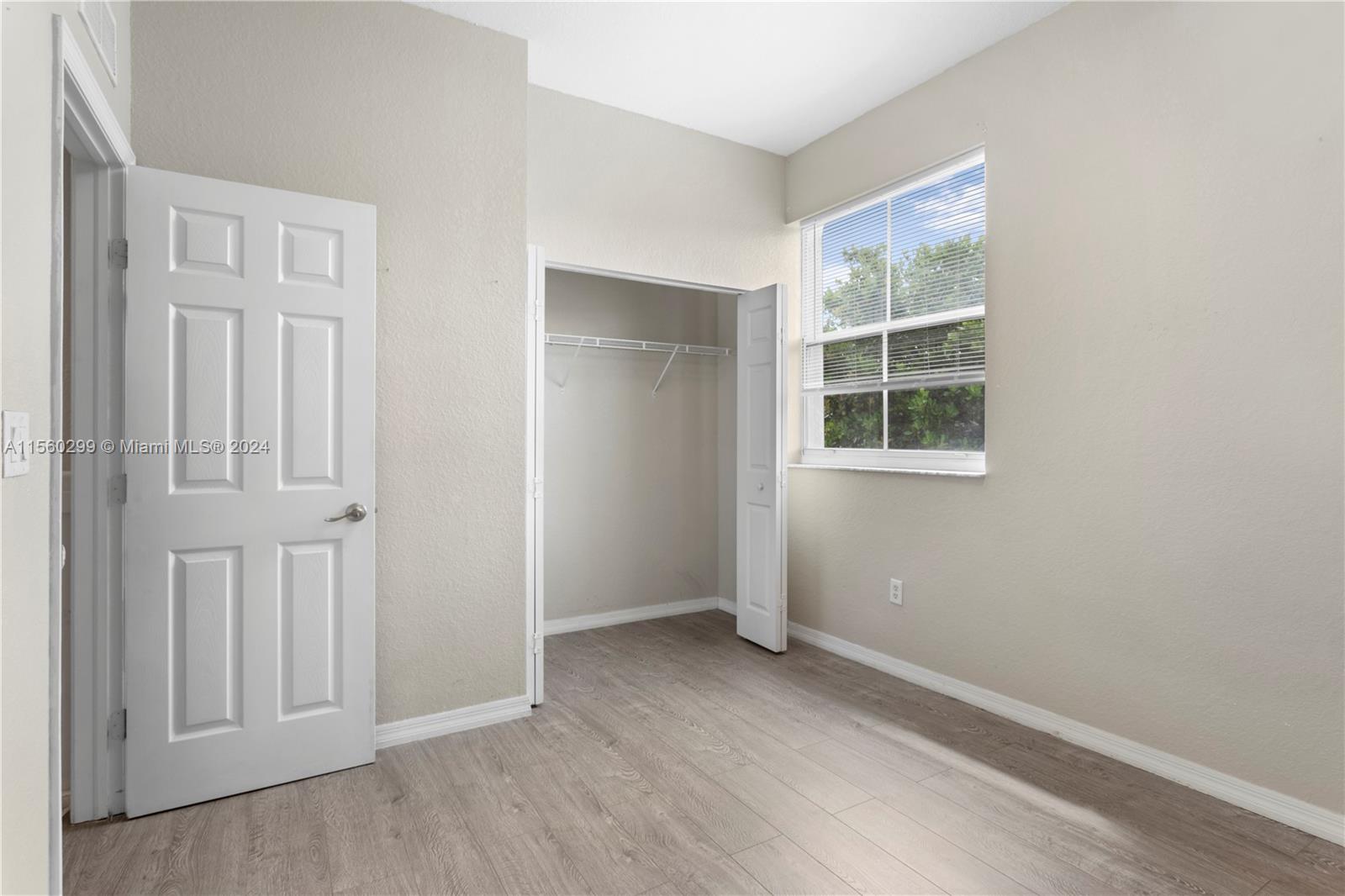 14033 Southwest 49th Street, Unit 6 Miramar, FL 33027 - Photo 22 of 25 an empty room with windows
