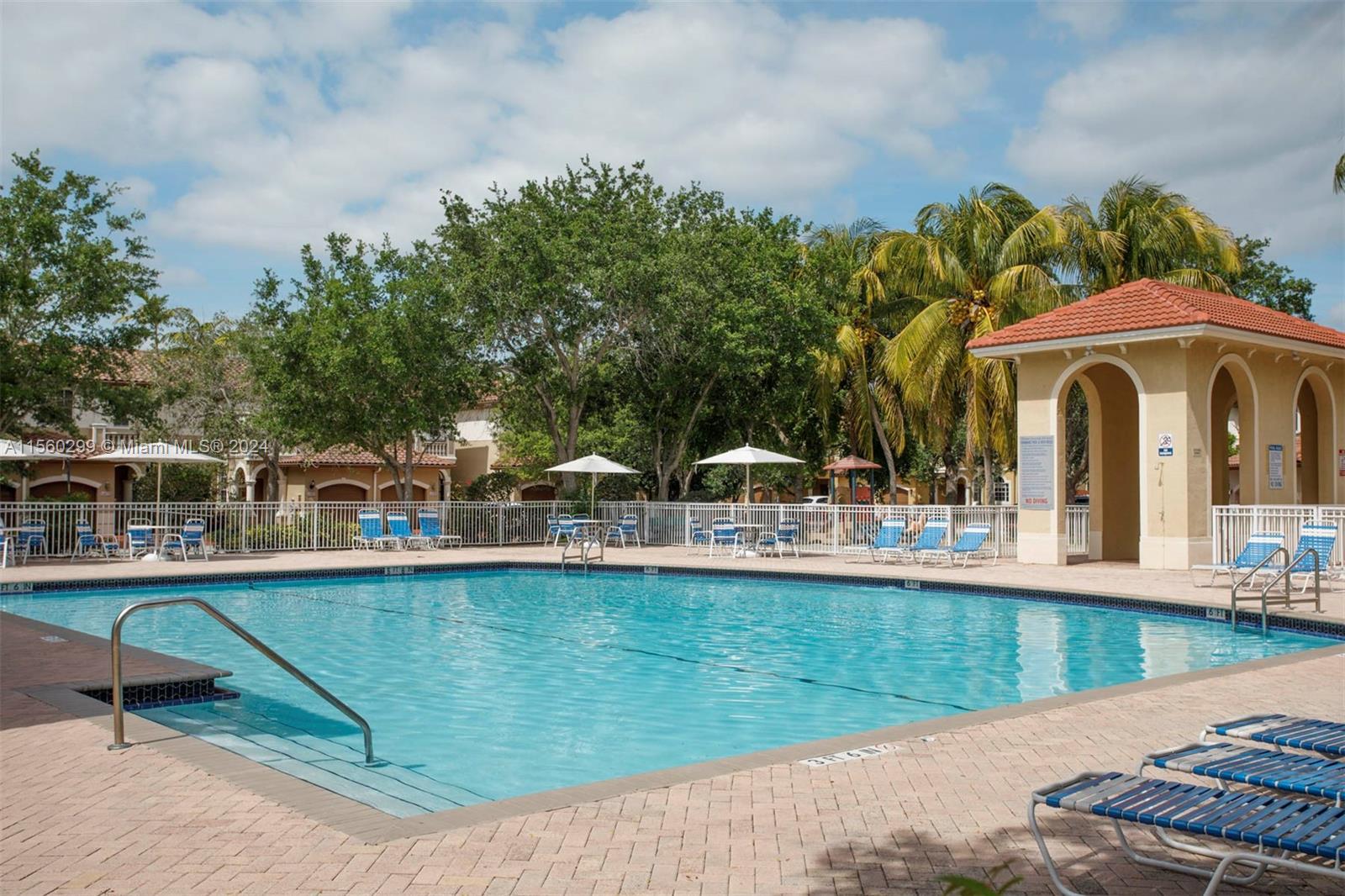14033 Southwest 49th Street, Unit 6 Miramar, FL 33027 - Photo 25 of 25 a view of a house with a yard and sitting area