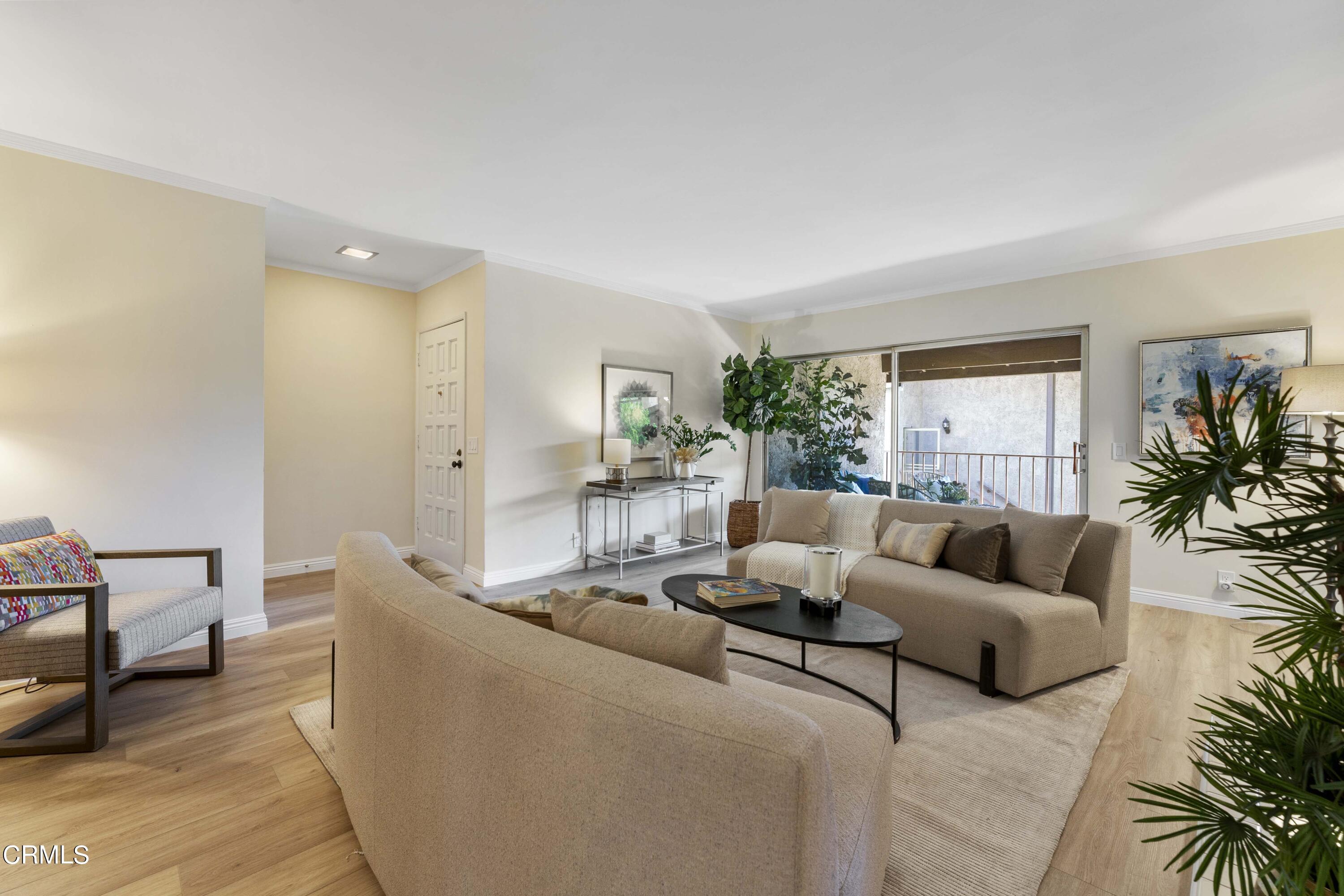 1161 West Duarte Road, Unit 20 Arcadia, CA 91007 - Photo 2 of 6 a living room with furniture and a large window