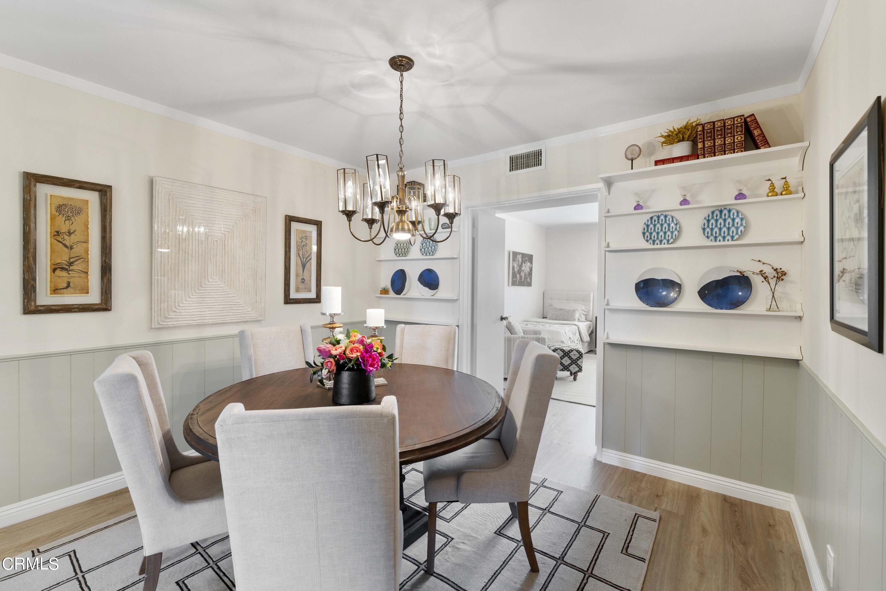 1161 West Duarte Road, Unit 20 Arcadia, CA 91007 - Photo 5 of 6 a view of a dining room with furniture and chandelier