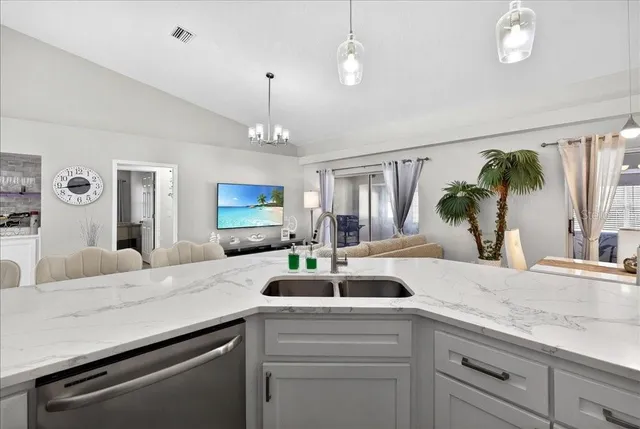 an aerial view of a house with a swimming pool