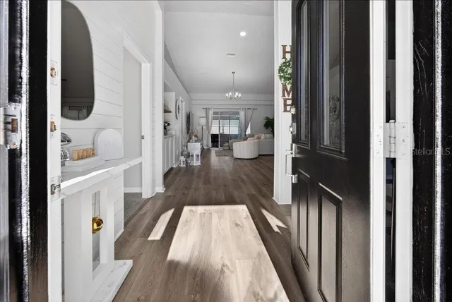 a view of a living room and dining room