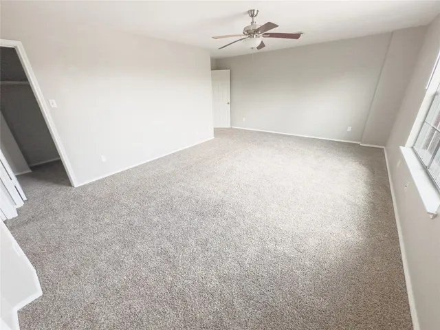 a view of balcony with wooden floor