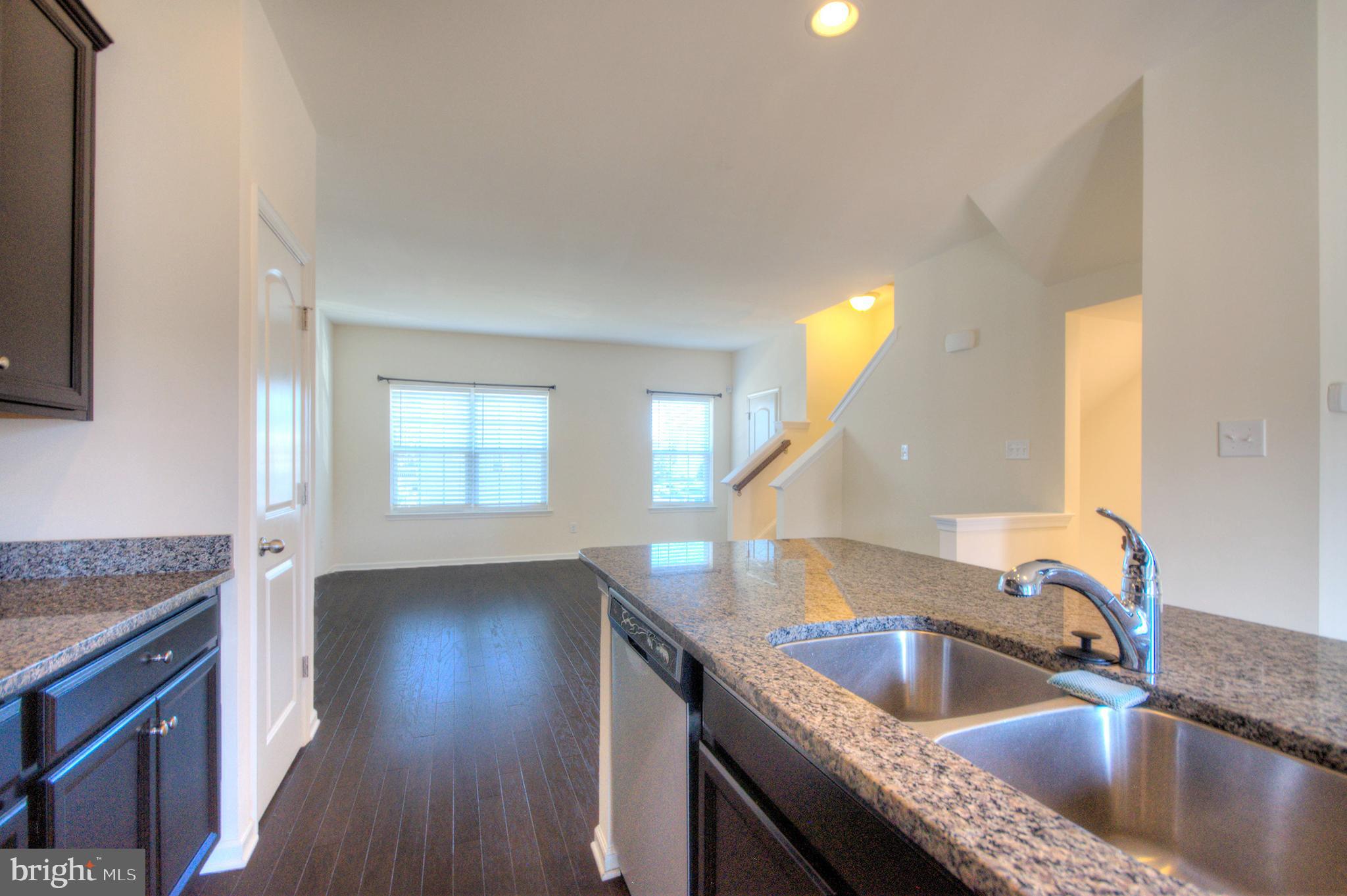 58 Iron Gate Road Marlton, NJ 08053 - Photo 19 of 47 a kitchen with granite countertop a sink a counter space and cabinets