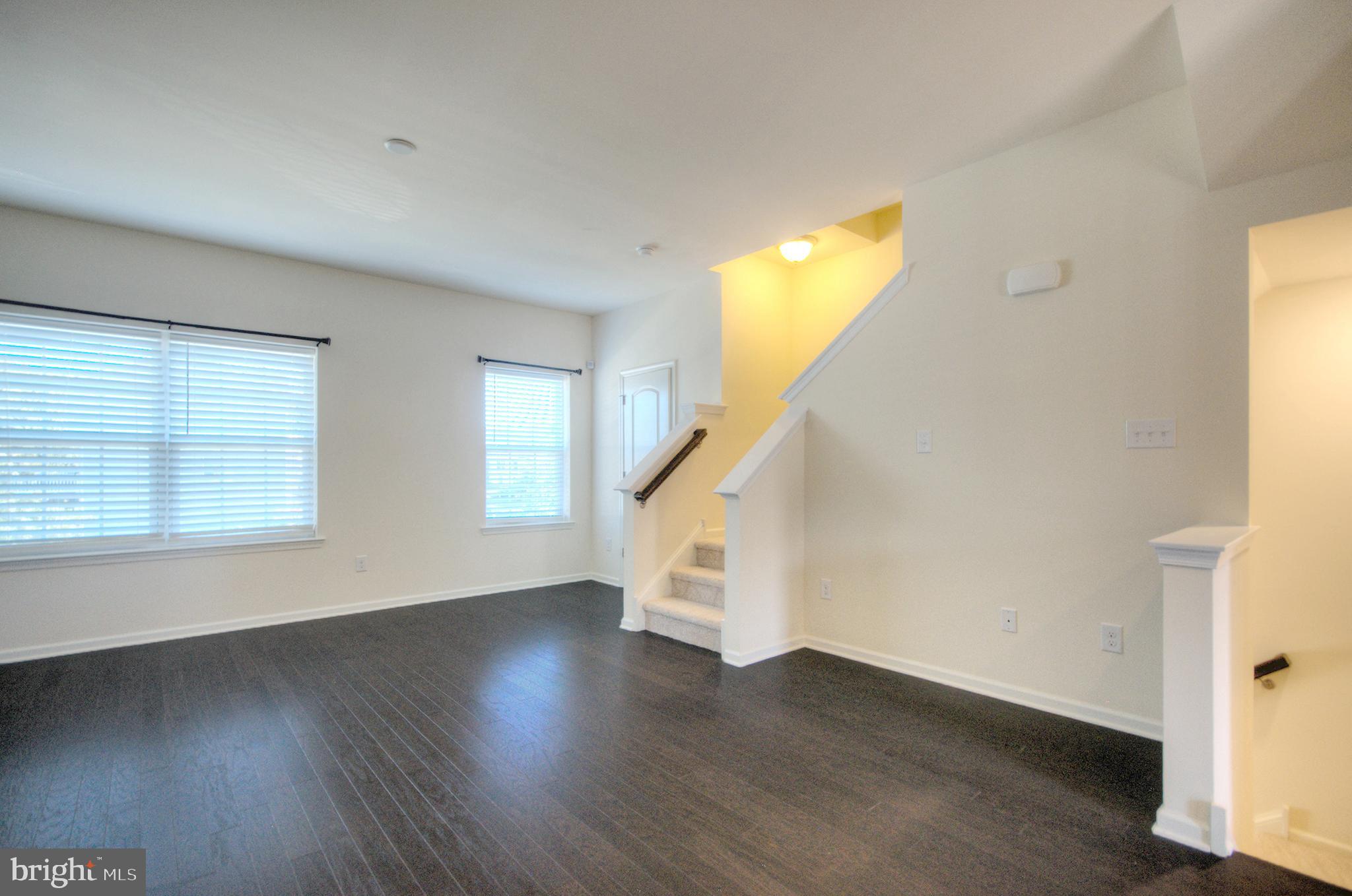 58 Iron Gate Road Marlton, NJ 08053 - Photo 21 of 47 a view of an entryway with wooden floor and windows