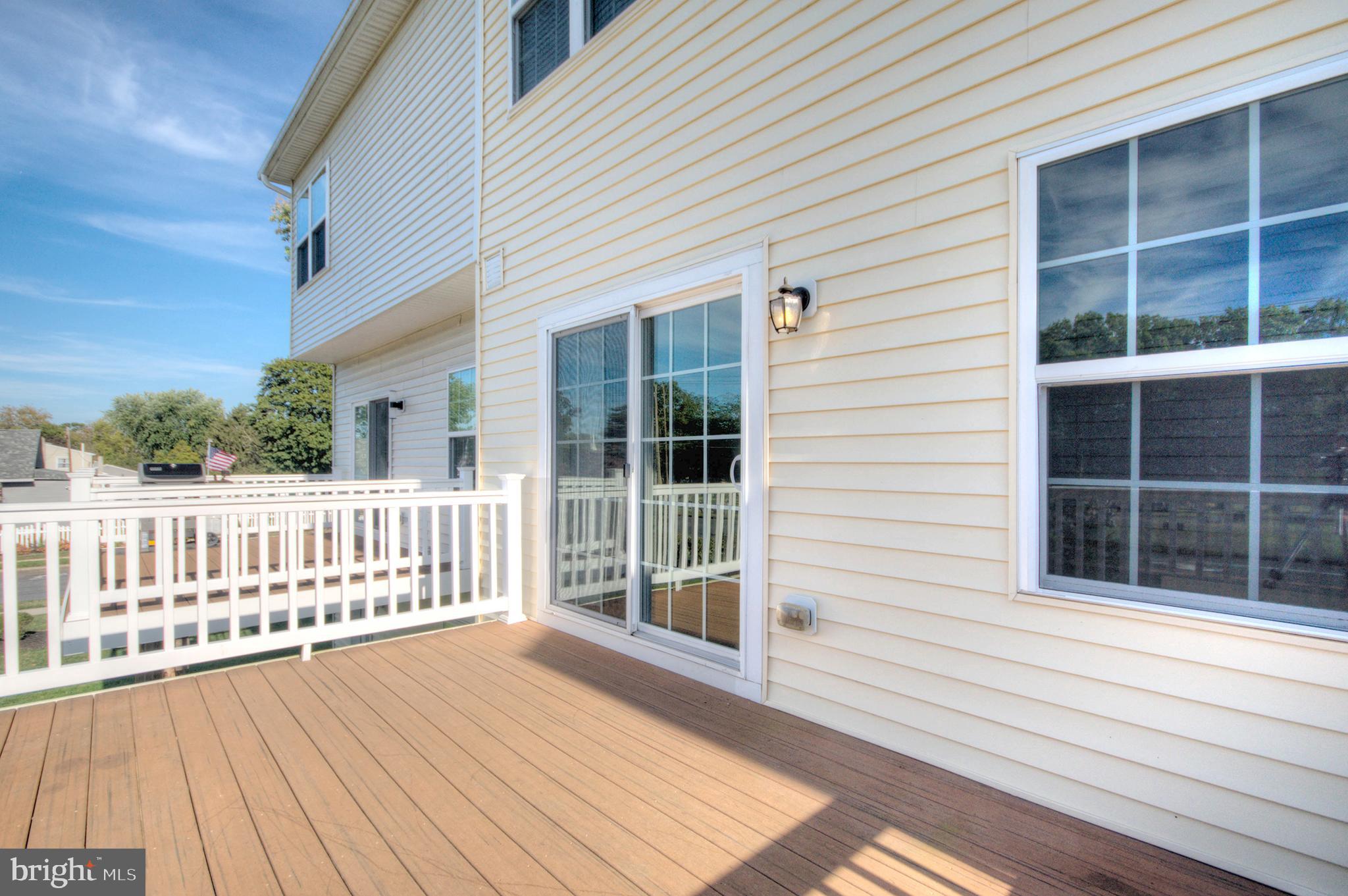 58 Iron Gate Road Marlton, NJ 08053 - Photo 30 of 47 a view of a wooden deck with a yard