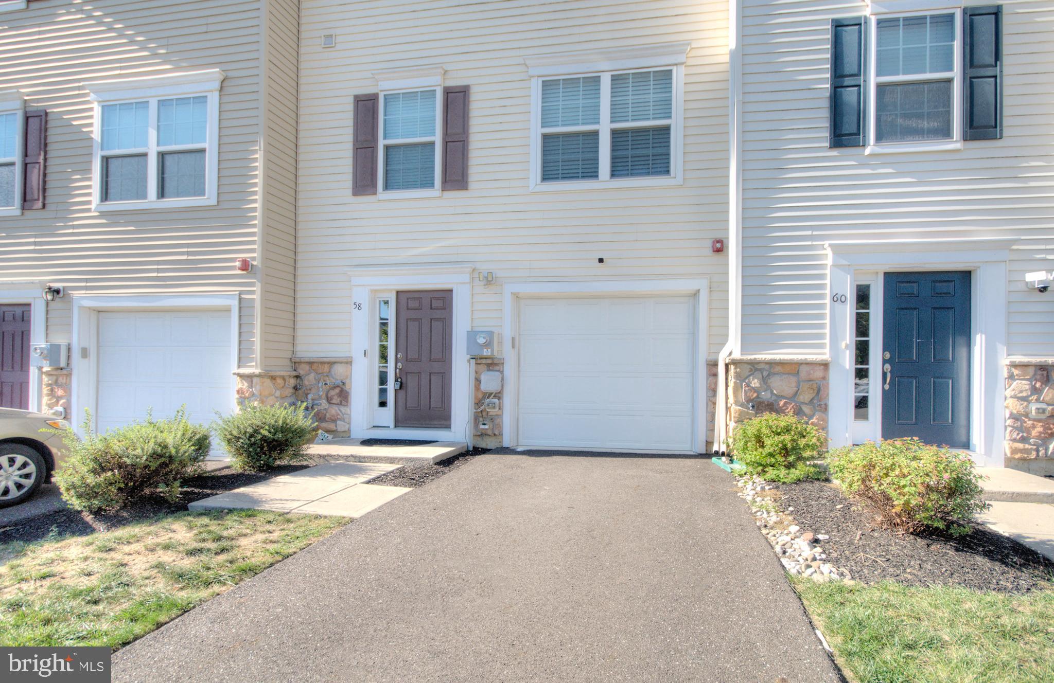58 Iron Gate Road Marlton, NJ 08053 - Photo 4 of 47 a front view of a house with garden