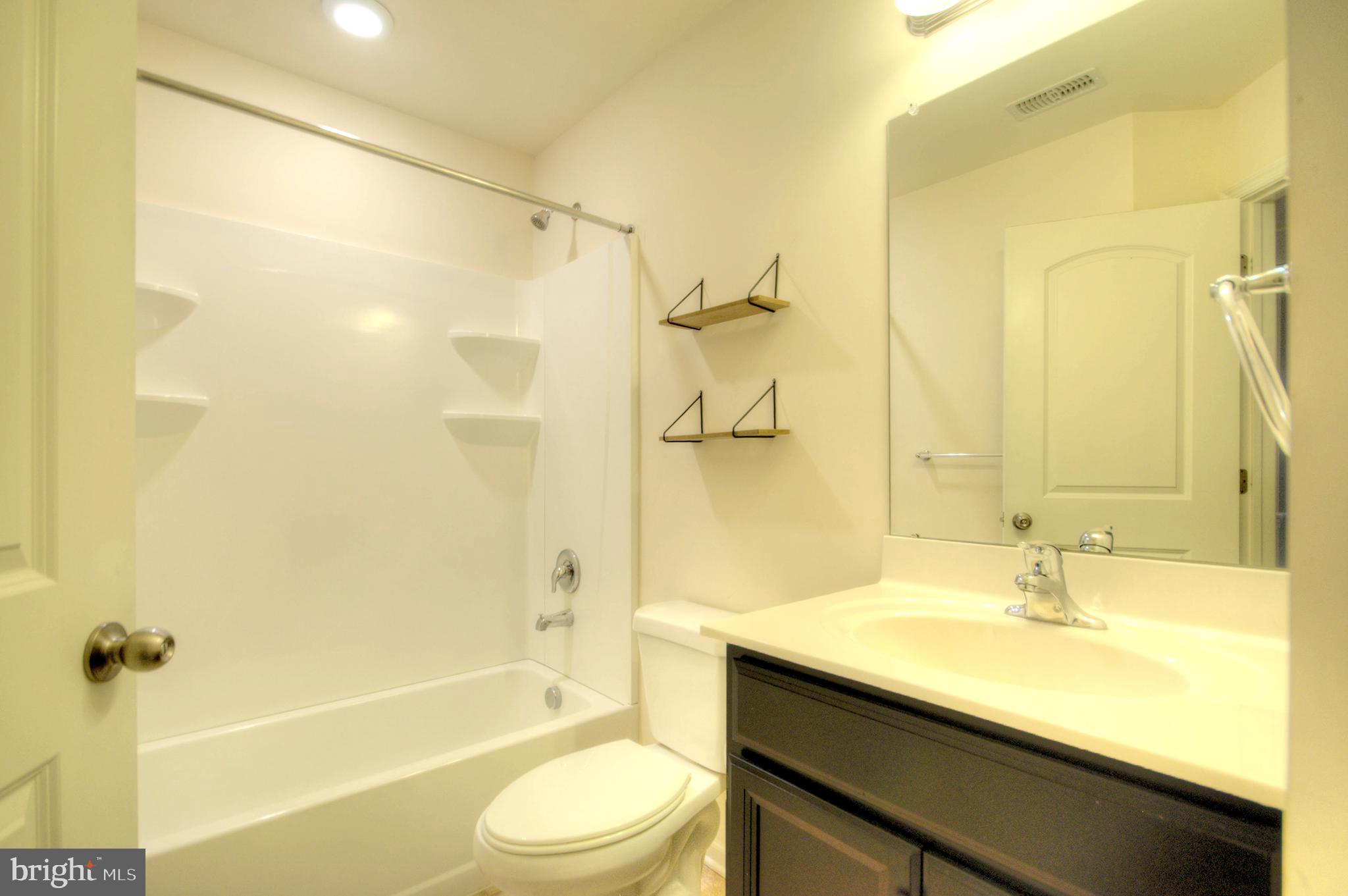 58 Iron Gate Road Marlton, NJ 08053 - Photo 47 of 47 a bathroom with a granite countertop sink toilet and shower