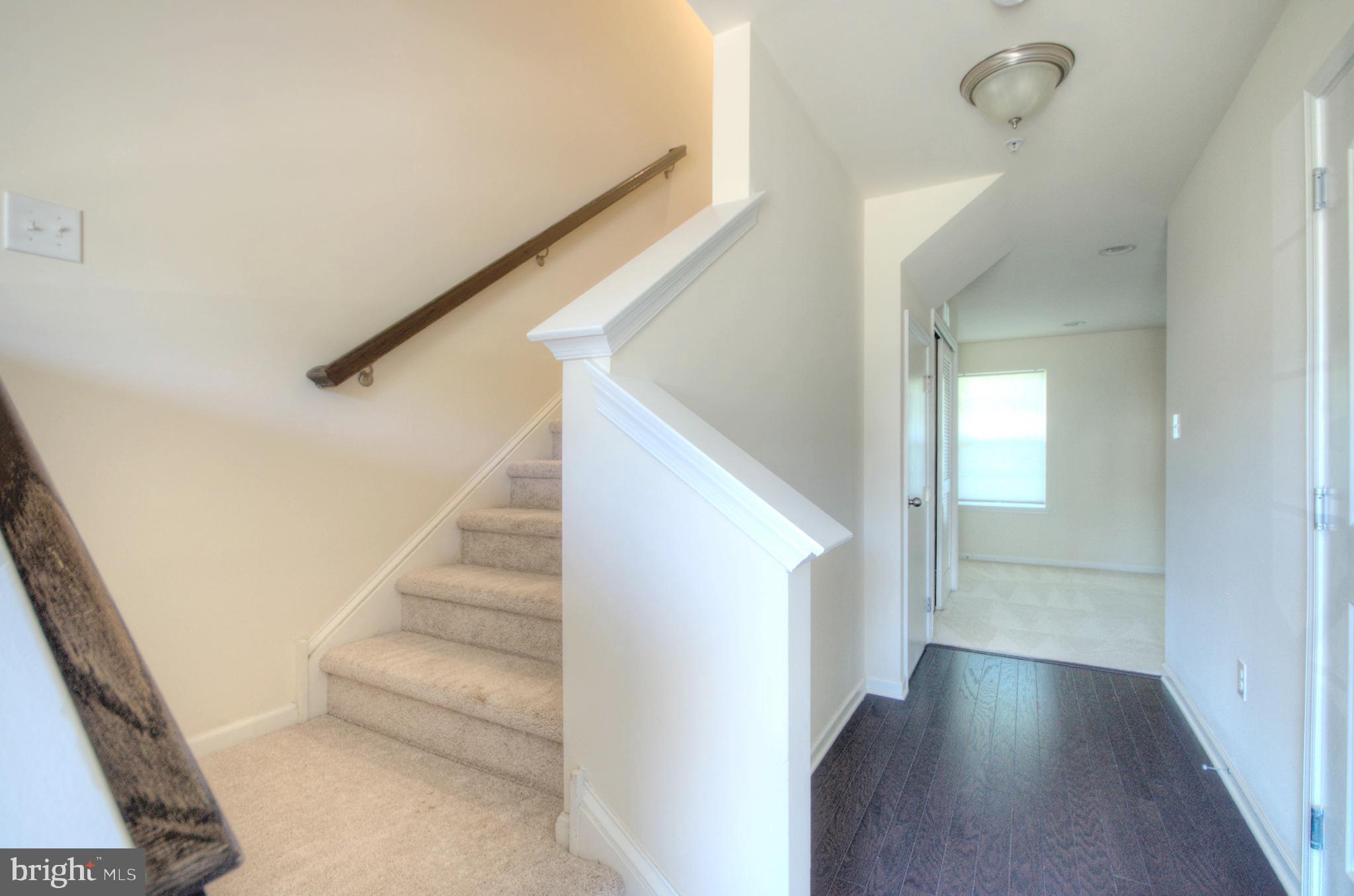 58 Iron Gate Road Marlton, NJ 08053 - Photo 9 of 47 a view of entryway and hall with wooden floor