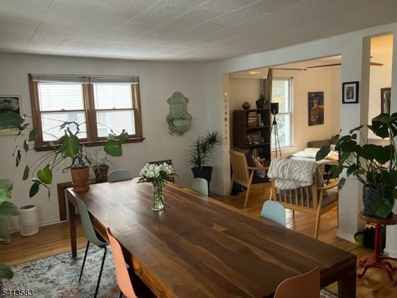 32 Pitt Street Bloomfield, NJ 07003 - Photo 5 of 10 a workspace with furniture window and wooden floor