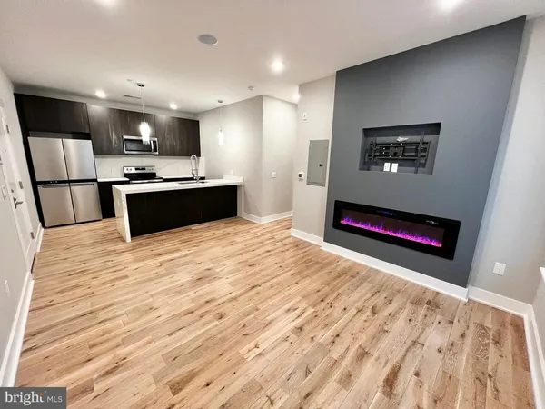 a view of an entryway with a hallway