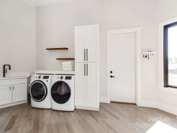 a utility room with dryer and washer