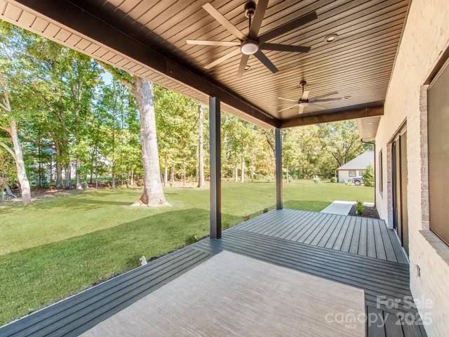 a view of porch with a garden