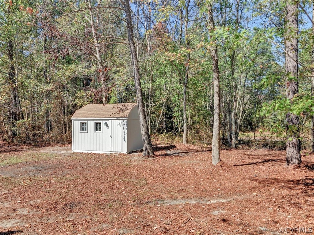 9201 Cattail Road Chesterfield, VA 23838 - Photo 29 of 35 a view of a house with a tree