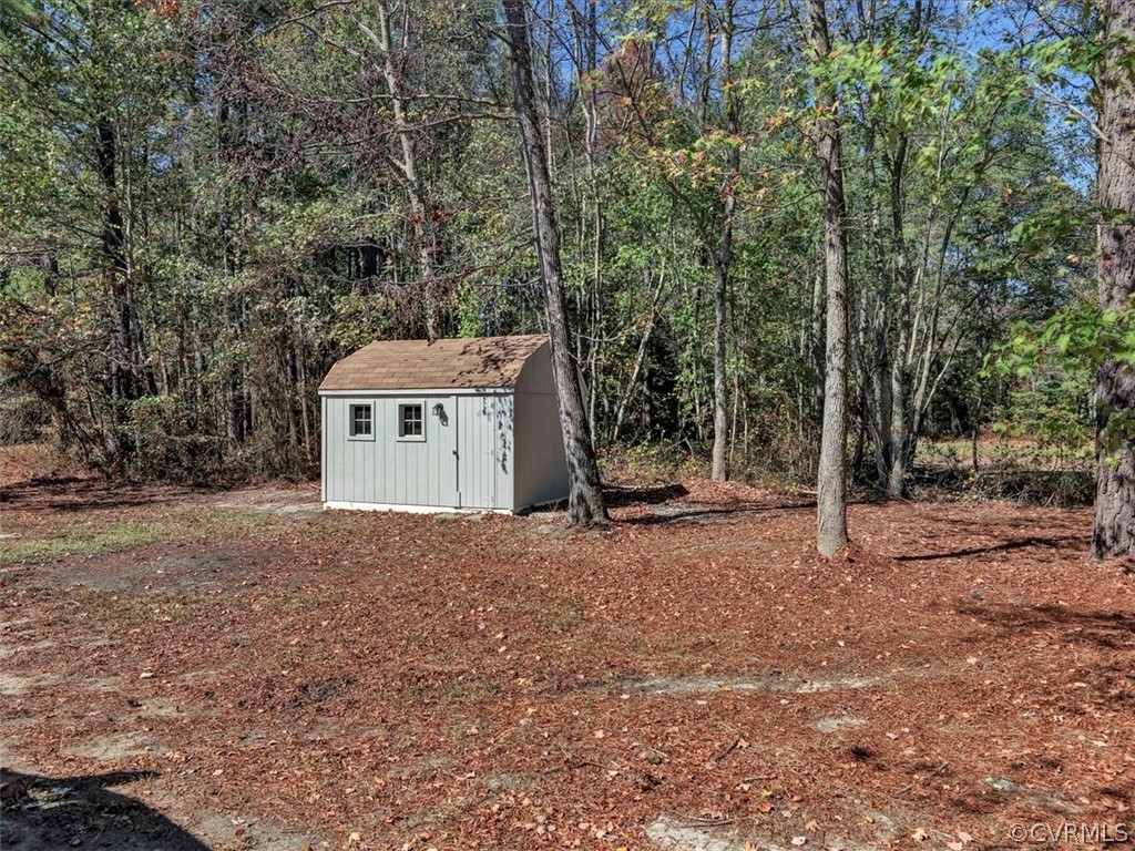 9201 Cattail Road Chesterfield, VA 23838 - Photo 30 of 35 a view of a house with a yard and tree