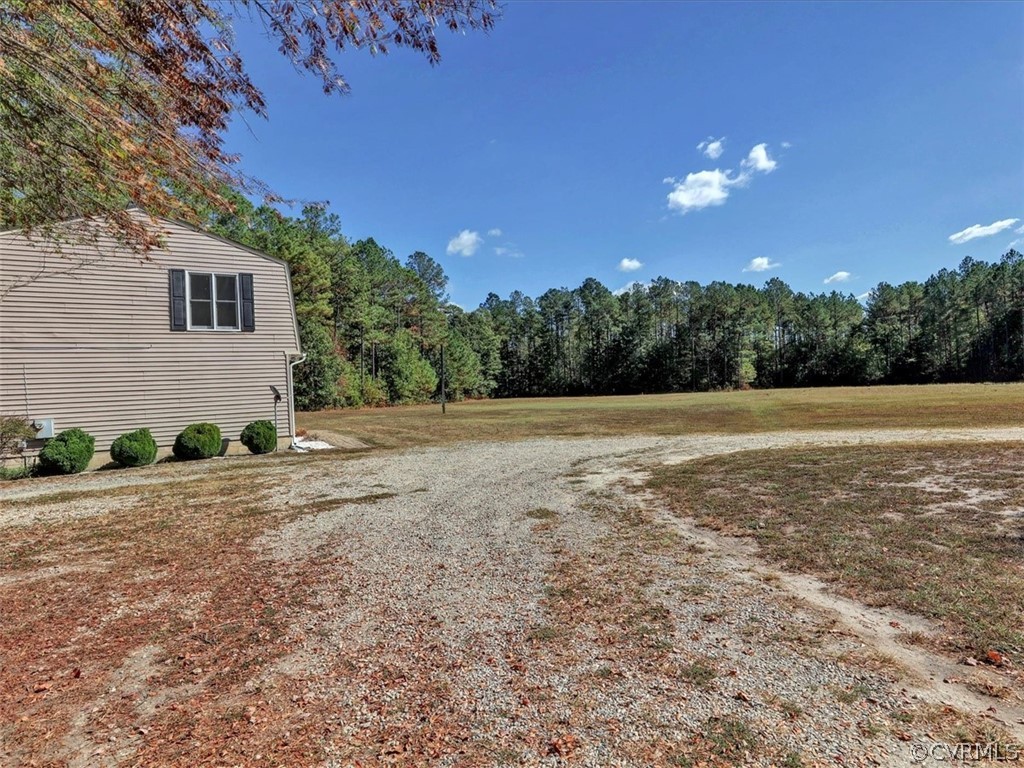 9201 Cattail Road Chesterfield, VA 23838 - Photo 31 of 35 a view of a backyard with green space