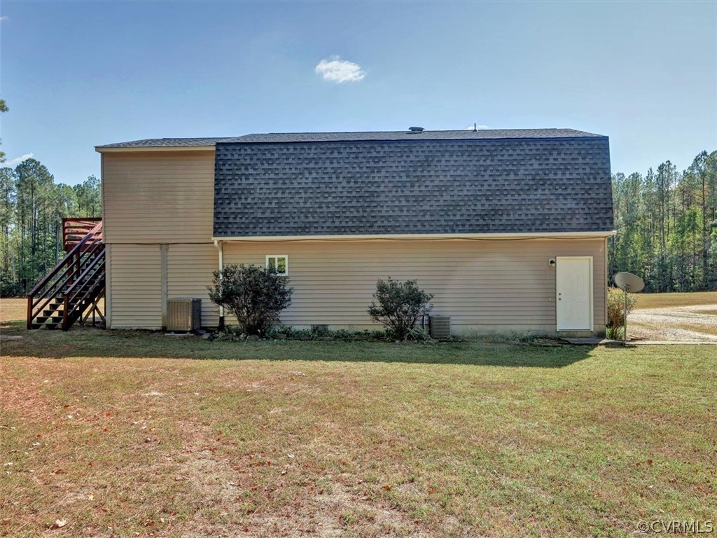 9201 Cattail Road Chesterfield, VA 23838 - Photo 32 of 35 a view of a house with a backyard