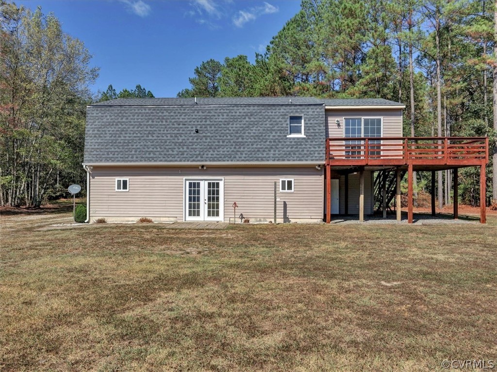 9201 Cattail Road Chesterfield, VA 23838 - Photo 5 of 35 a front view of a house with a yard and garage