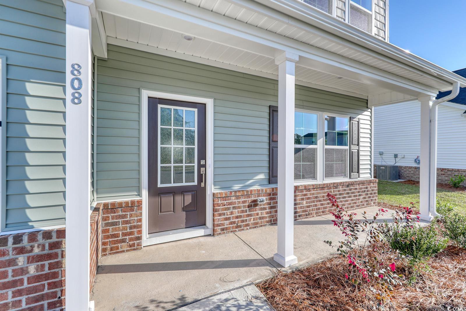 808 St Albans Loop Conway, SC 29526 - Photo 2 of 29 Doorway to property with covered porch, brick sidi