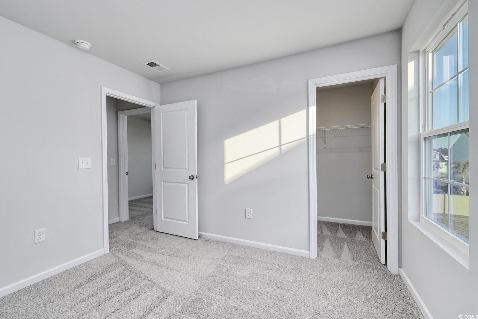 808 St Albans Loop Conway, SC 29526 - Photo 25 of 29 Unfurnished bedroom featuring carpet floors, multi