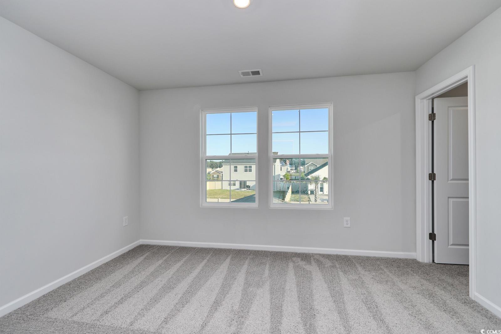 808 St Albans Loop Conway, SC 29526 - Photo 26 of 29 Spare room featuring carpet and baseboards