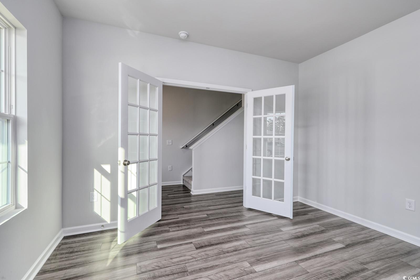 808 St Albans Loop Conway, SC 29526 - Photo 5 of 29 Spare room with french doors, wood finished floors