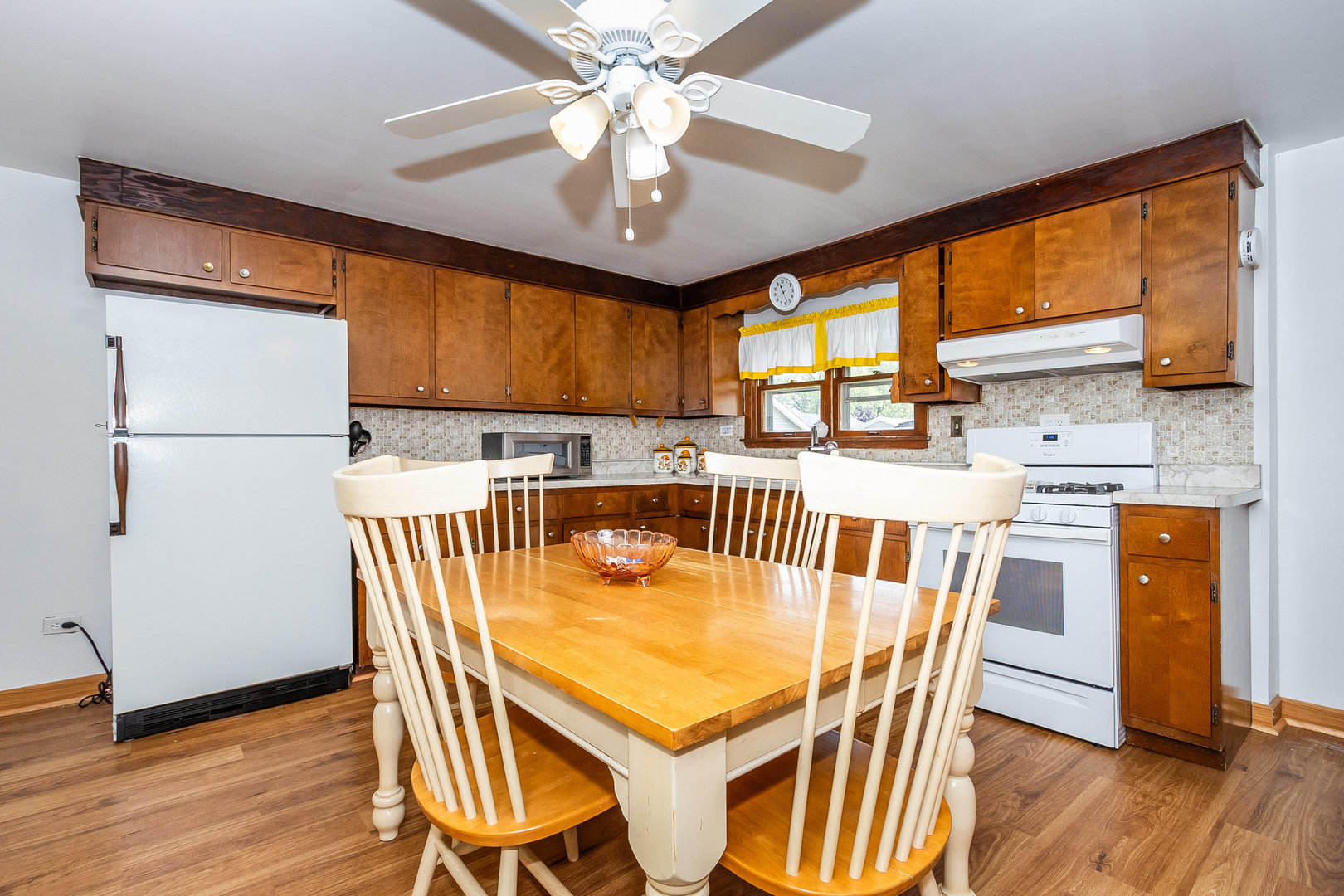 95 West 34th Street Steger, IL 60475 - Photo 12 of 21 a view of a dining room with furniture window and wooden floor