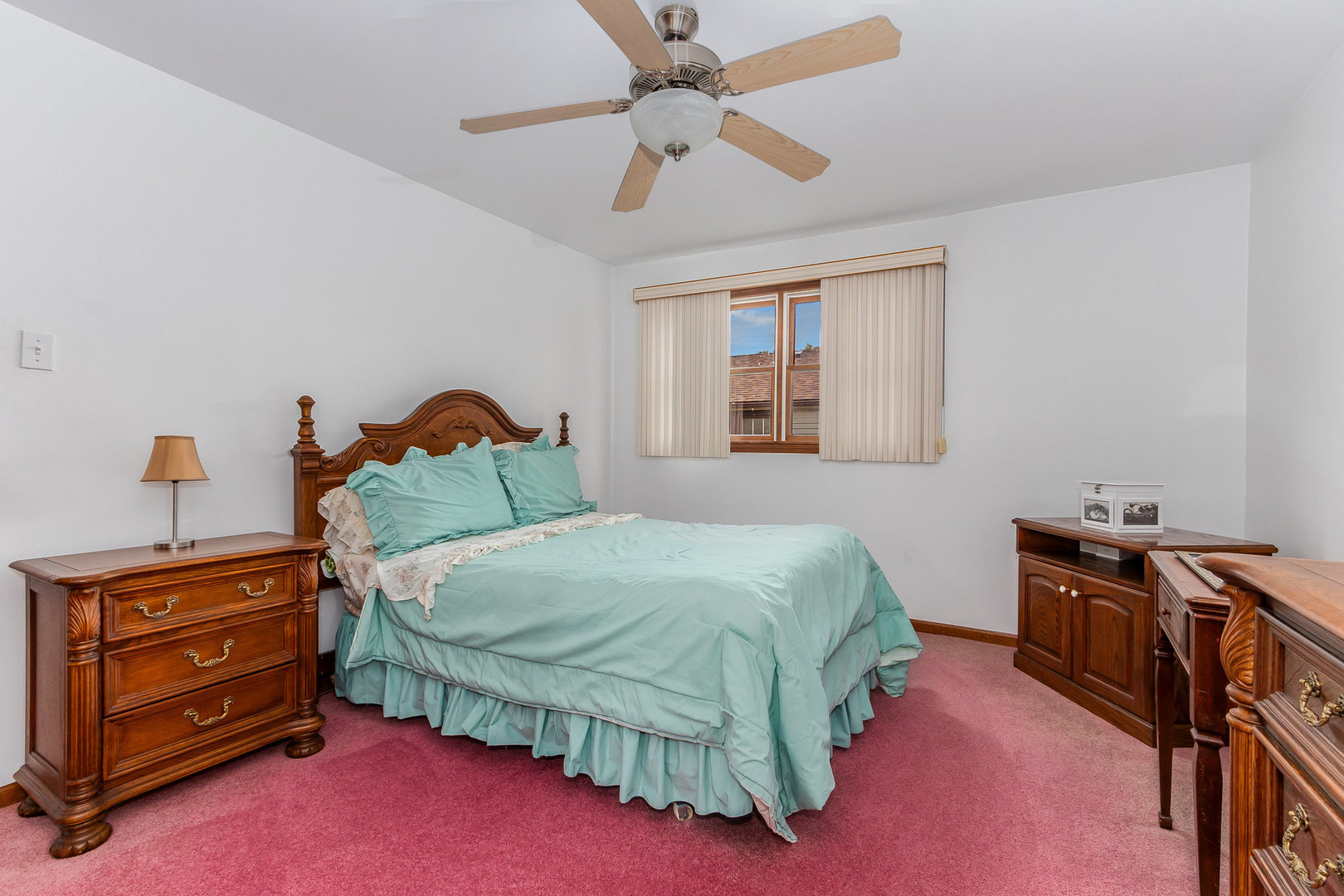 95 West 34th Street Steger, IL 60475 - Photo 14 of 21 a bedroom with a bed dresser and a window