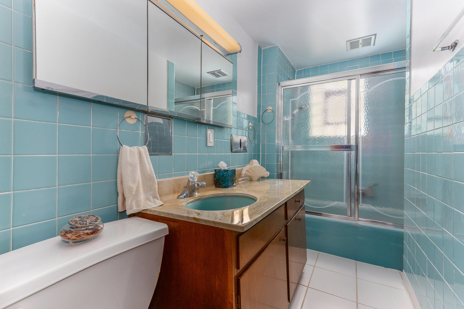 95 West 34th Street Steger, IL 60475 - Photo 16 of 21 a bathroom with a granite countertop sink a toilet and shower