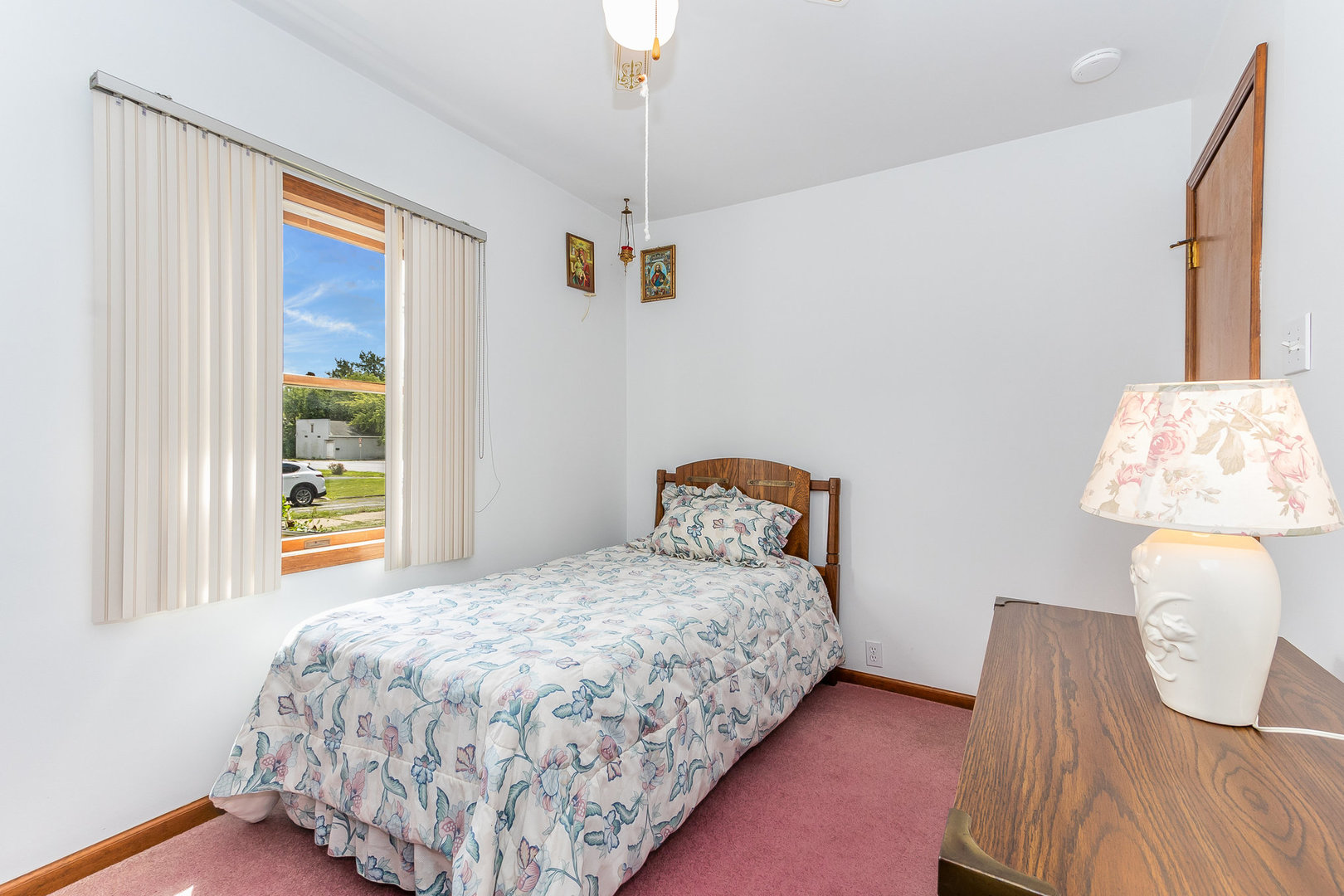 95 West 34th Street Steger, IL 60475 - Photo 18 of 21 a bedroom with a bed and a window