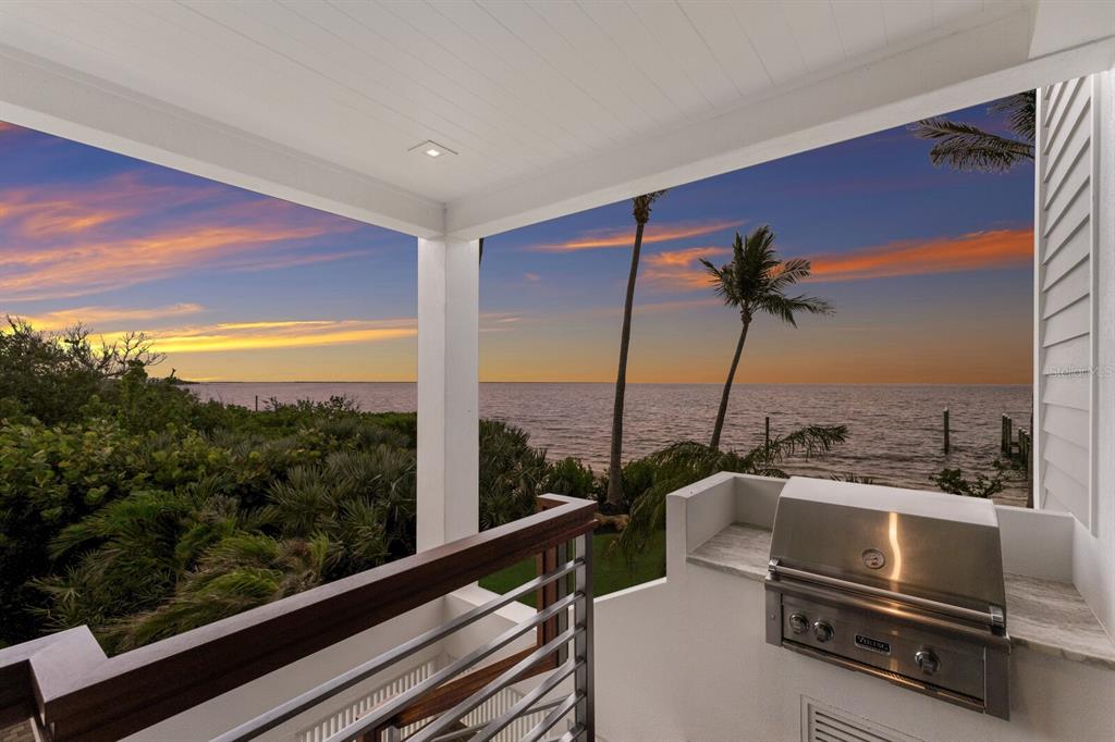 641 Boca Bay Drive Boca Grande, FL 33921 - Photo 19 of 74 a view of a balcony with chairs