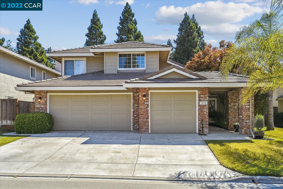 1090 Quartermaster Canyon Road San Ramon, CA 94582 - Photo 1 of 1 a front view of a house with garden